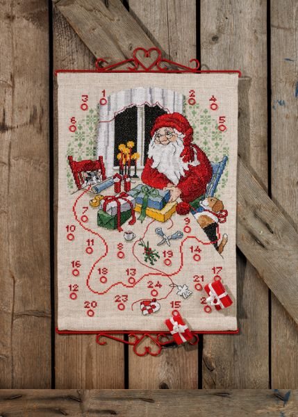 Pakkekalender - julemanden i det lune hus med dyr og gaver